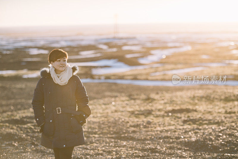 asian chinese female portrait at iceland during sunset